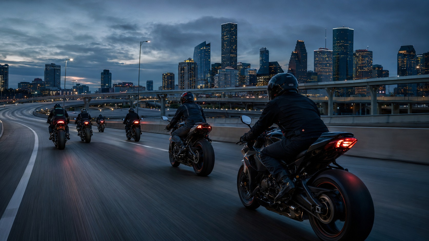 Motorcycles riding through Houston at blue hour